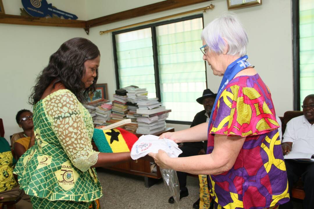 Ms-Louise-Webb-right-presenting-a-gift-to-Mrs-Valencia-Quame-former-headmistress-of-Ada-Senior-High-School