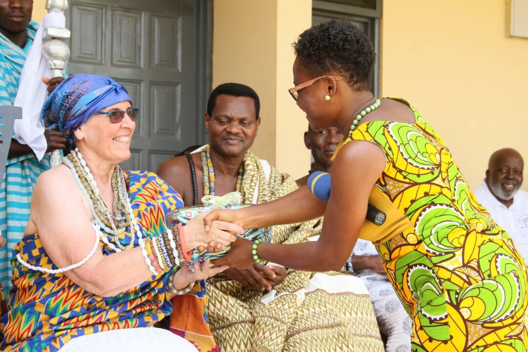 Naana-Kabukie-Adasco-I-Ms-Louise-Webb-receiving-a-special-parcel-from-Adelaide-Abayateye-the-then-Assistant-Headmistress-of-Ada-Senior-High-School-after-her-enstoolment